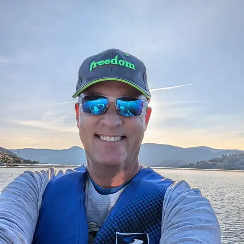 Sean Phillips out on Okanagan Lake at sunset